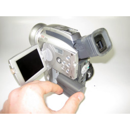Снятие и замена батареи Canon Optura 100MC